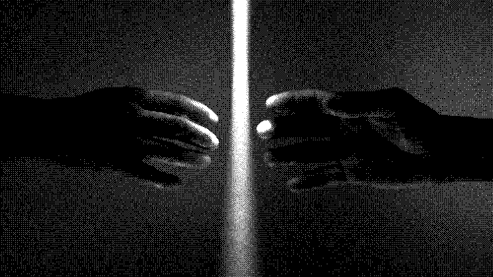 Two hands reaching toward each other through a beam of light, concept of connection and distance