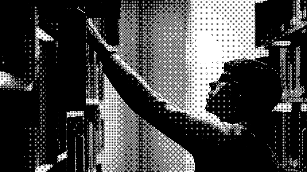 Person reaching for book on shelf