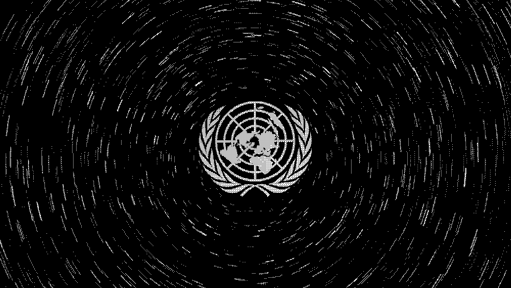 The United Nations eblem, consisting of a map of the world surrounded by olive branches